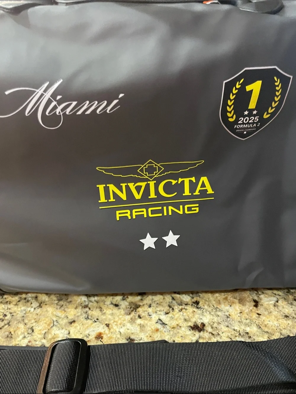 Invicta Racing Black Travel Bag with Yellow Logo